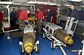 US Navy 030319-N-4142G-020 Ordnance handlers assemble Joint Direct Attack Munition (JDAM) bombs in the forward mess decks