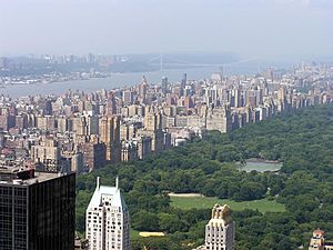 The Upper West Side on the left, and Central Park on the right, as seen from the Top of the Rock observatory at Rockefeller Center. In the distance is the Hudson River on the far left, and the George Washington Bridge in the background.