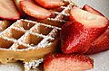 Waffle with strawberries and confectioner's sugar