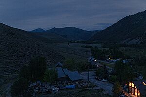 Looking northeast out of Triumph, Idaho at dusk on June 22nd, 2021. The community of Triumph is visible in the foreground
