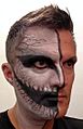 Man with Halloween makeup fifty-fifty