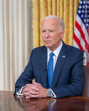 President Joe Biden delivers remarks from the Oval Office (Smaller table)
