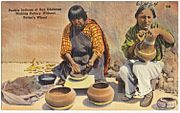 Pueblo Indians of San Ildefonso making pottery without pottery's wheel