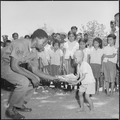 United States Air Force Staff Sergeant Richard Rolle of the 41st Tactical Electronic Warfare Squadron gives a school... - NARA - 542308