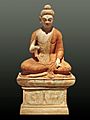 A statue depicting Buddha giving sermon, from Sarnath, now at Museum of Asian Art, Dahem Berlin