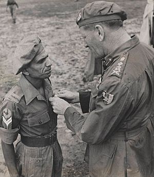 Naik Narayan Sinde, 5th Mahratta Light Infantry, receiving the Indian Distinguished Service Medal from General Sir Claude Auchinleck, 1945
