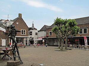 Renkum town streetview with church tower in the background