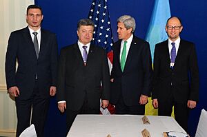 Secretary Kerry Poses for a Photo With Ukrainian Opposition Leaders in Munich