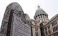 Picture of a large stone monument displaying the ten commandments with the Texas State Capitol in Austin in the background. The picture was part of a news release Wednesday, March second, 2005, by then Attorney General Abbott.
