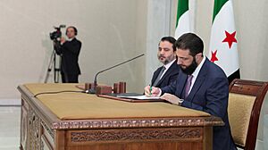 Ahmed al-Sharaa signs the interim constitution (2025)