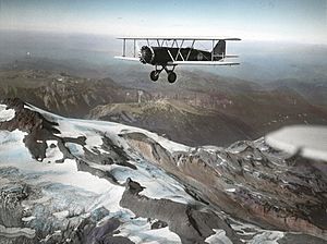 Boeing Model 40 over mountains circa 1930s