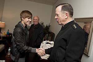 Chairman of the Joint Chiefs of Staff Adm. Mike Mullen Justin Bieber The Daily Show