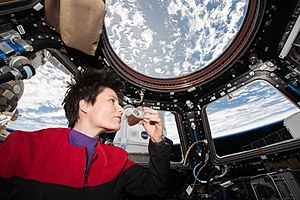 ISS-43 Samantha Cristoforetti drinks coffee in the Cupola