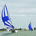 Sailboat on broad reach with spinnaker