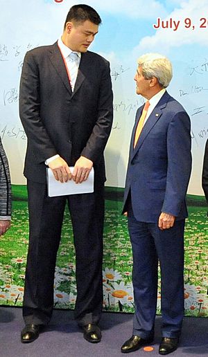 Secretary Kerry Chats With Former NBA Player Yao After Wildlife Trafficking Event in Beijing (14611584355) (cropped)