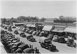 Parade of vehicles from Civilian Conservation Corps Camp BR-7 in Lovell, Wyoming