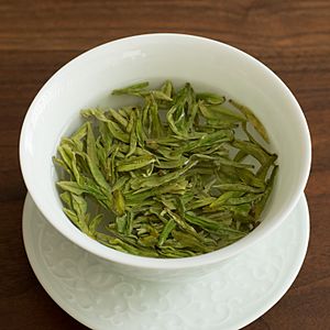 Longjing tea steeping in gaiwan.jpg