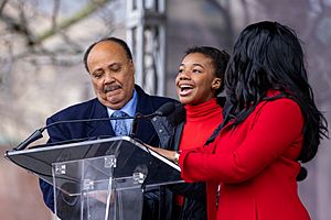 Martin Luther King III and daughter Yolanda Renee King speak at the unveiling of "The Embrace" sculpture in Boston