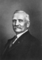 Portrait of James M. Comstock (1838–1918) from History of the City of Spokane and Spokane County, Washington, Volume 2.png