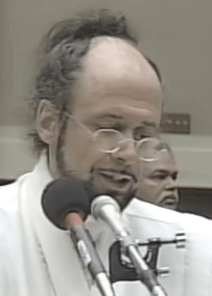 Raël testifying in Congress (cropped).png