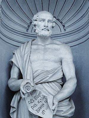 A statue of Theophrastus wearing a robe and unfurling a scroll