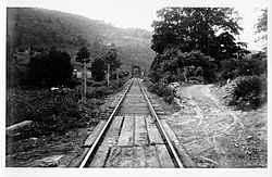 Rail track and bridge near Owasco, 1870