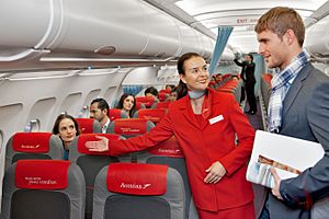 Austrian Airlines flight attendant and passenger