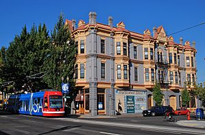 Barber Block sunlit with streetcar, 2012