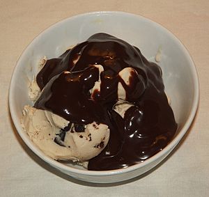 Chocolate syrup topping on ice cream