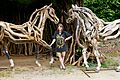 Sculptor Heather Jansch, flanked by two of her life-size horses. "Atlantis" on Heather's right, and "The Eden Horse" on her left.