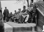 Dignitaries sitting on the ceremony's dais