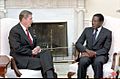 President Ronald Reagan meeting with Prime Minister Robert Mugabe of Zimbabwe