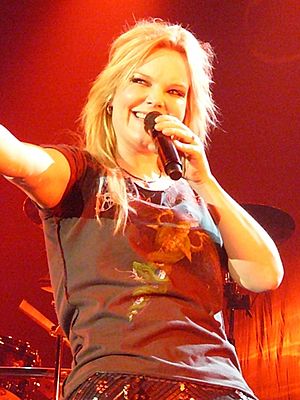 Anette Olzon with Nightwish live in Mantova, Italy, 2009.jpg