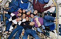 Crewmembers of STS-71, Mir-18 and Mir-19 Pose for Inflight Picture - GPN-2002-000061 rotated.jpg