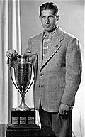 Elmer Lach with Hart Memorial Trophy