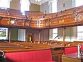 Interior view of the tiered gallery with decorative woodwork c1880 at Plough Lane Chapel, Lion Street, Brecon