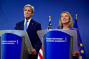 Secretary Kerry Listens to EU High Representative Mogherini Deliver Statements to Waiting Reporters at the Headquarters of the European Commission in Brussels (27324615843)