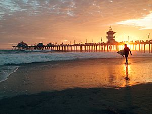 Surfer at Huntington Beach Pier