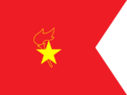 A gold star placed on top of a red torch with a flame, outlined in gold. This is placed on a red background, where the right edge has a triangle section cut out.
