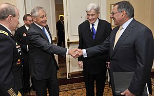 Defense.gov News Photo 120509-D-NI589-439 - Former Sen. Chuck Hagel shakes hands with Secretary of Defense Leon E. Panetta shortly before Panetta and Chairman of the Joint Chiefs of Staff Gen