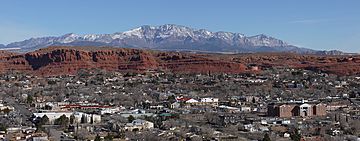 A photo of St. George with the Pine Valley Mountains in the background