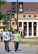 Southern Arkansas students walking on campus