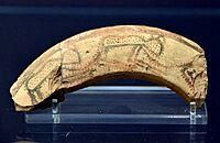 Two sherds (fragments of a pottery vessel). The exterior is painted with a design; lustrous black paint on apricot-colored clay with a burnished surface. The design of spotted animals possibly represents leopards. From Tell Arpachiyah
