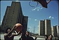 BLACK YOUTHS PLAY BASKETBALL AT STATEWAY GARDENS' HIGHRISE HOUSING PROJECT ON CHICAGO'S SOUTH SIDE. THE COMPLEX HAS... - NARA - 556162