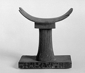 Egyptian wooden pillow with inscription on base Wellcome L0006750