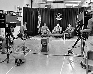 Deke Slayton (on stool at left), Buzz Aldrin, Neil Armstrong, and Michael Collins during the last pre-flight press conference