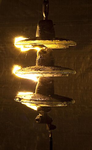 Electrical insulator flashover from volcanic ash