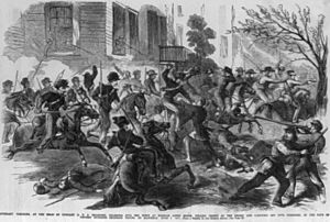 Lieutenant Tompkins, at the head of Company B, U.S. Dragoons, charging into town at Fairfax Court House, killing thirty of the enemy and carrying off five prisoners, in the face of fifteen LCCN99614100
