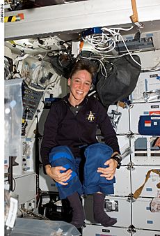Lisa Nowak floats on the middeck of the Space Shuttle Discovery
