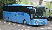 Mercedes-Benz Tourismo (vue avant droite) - Triangle Voyages (Amboise * été 2018) (cropped).jpg